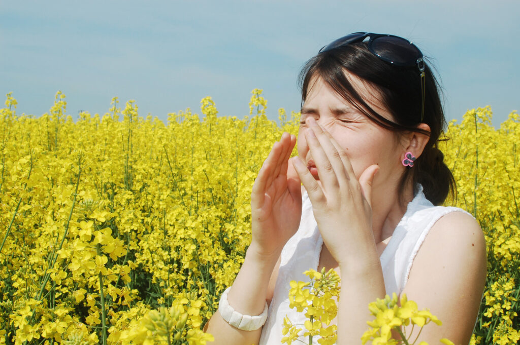 woman sneezing